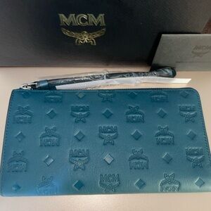 Authentic - New MCM Aren Zip Around Wallet in Embossed Monogram Leather Teal